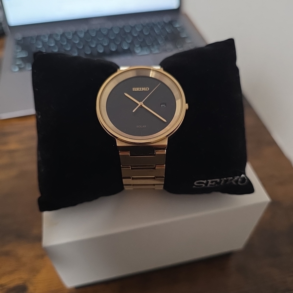 Seiko Men's Gold Tone Solar Watch with Black Dial